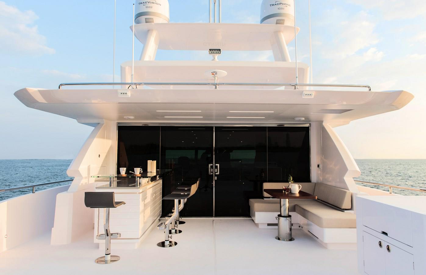 FD87 Aqua Life boat deck with bar, bar stools, dinette and skylounge doors closed.