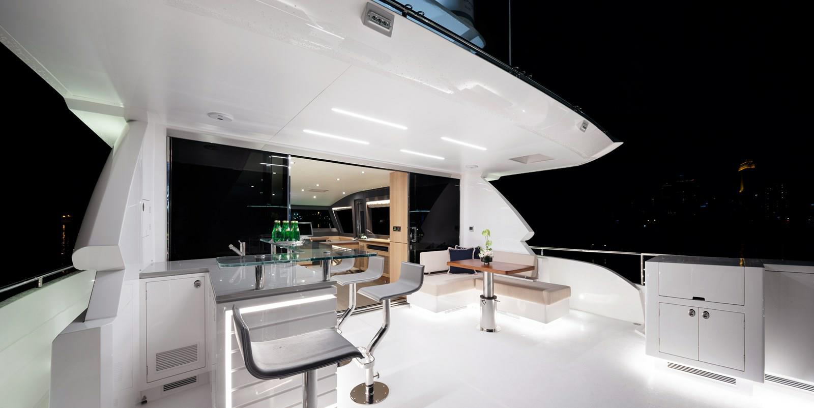 FD87 Aqua Life boat deck with bar, barstools and dinette.