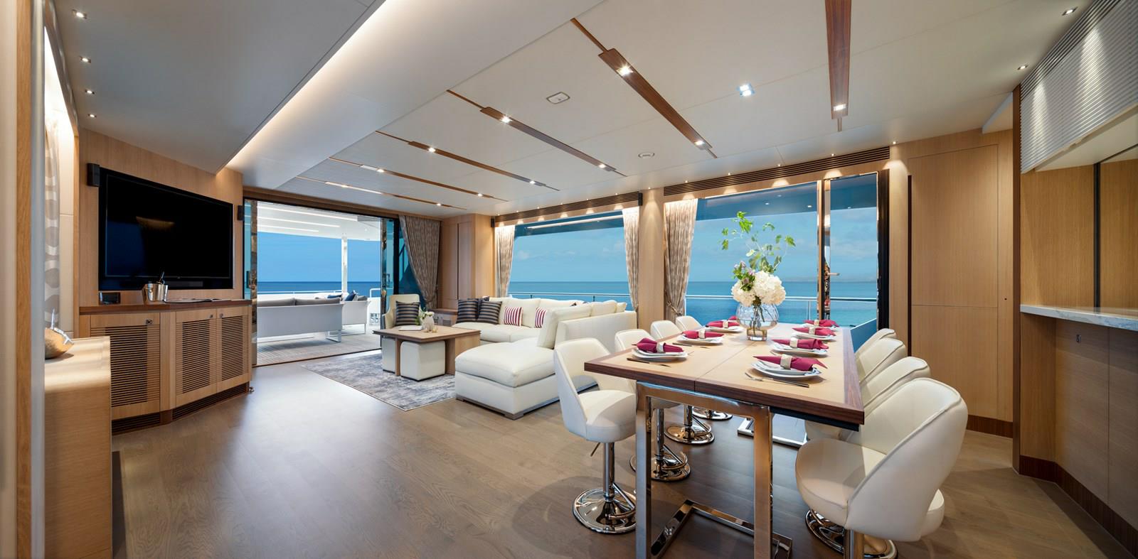 FD87 Aqua Life view looking aft of formal dining, main salon and TV.