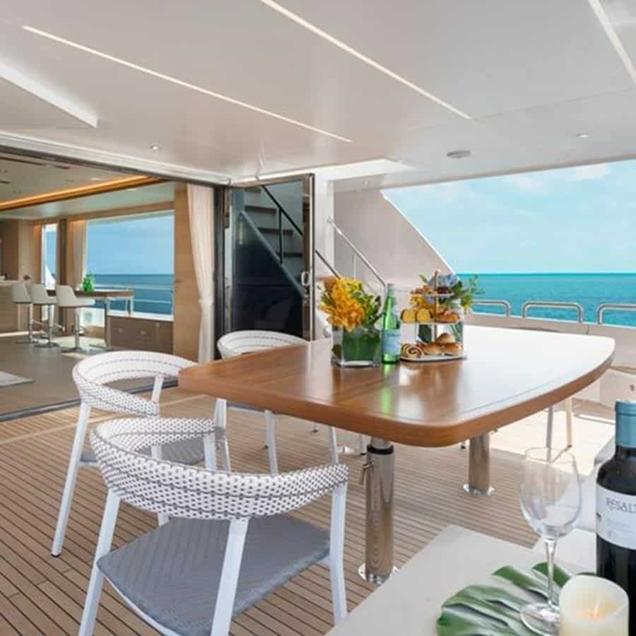 Aft Deck Table and Four Chairs | 2020 HORIZON 80' MY - One More TIme